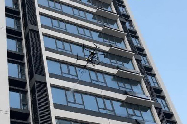 How High Can a Window Washing Drone Actually Reach?