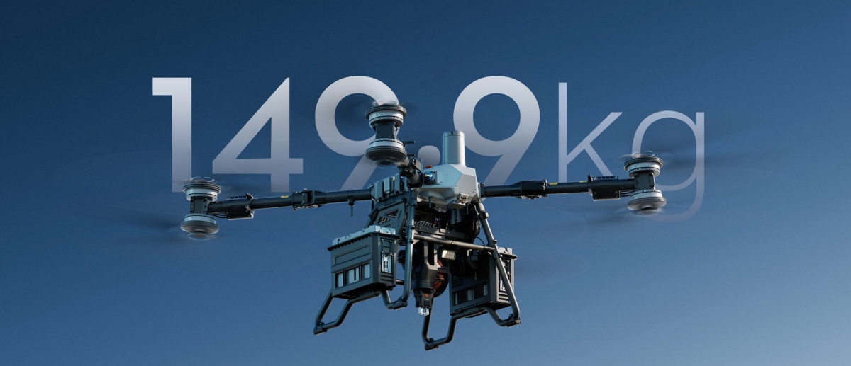 DJI FlyCart 100 cargo drone carrying 80kg payload over mountainous terrain DJI FlyCart 100 cargo drone carrying 80kg payload over mountainous terrain