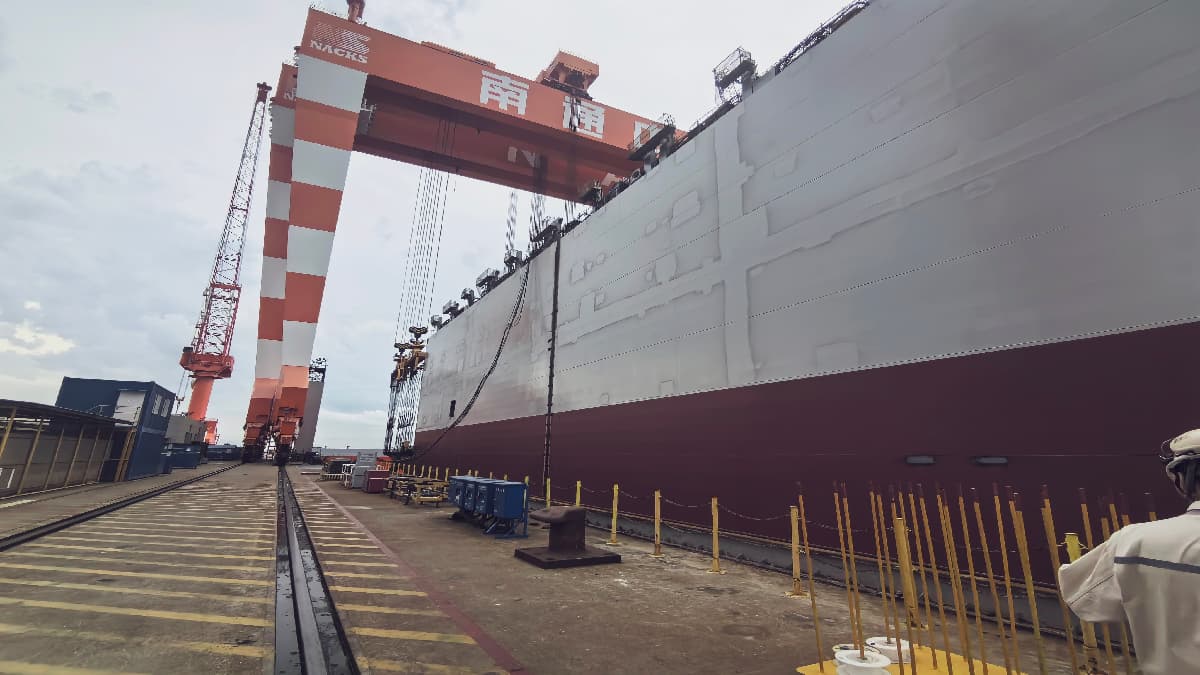 DJI Matrice drone performing automated bubble testing on ship hull welds for leak detection