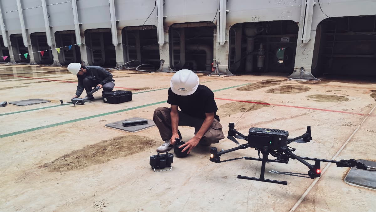 DJI Matrice drone performing automated bubble testing on ship hull welds for leak detection