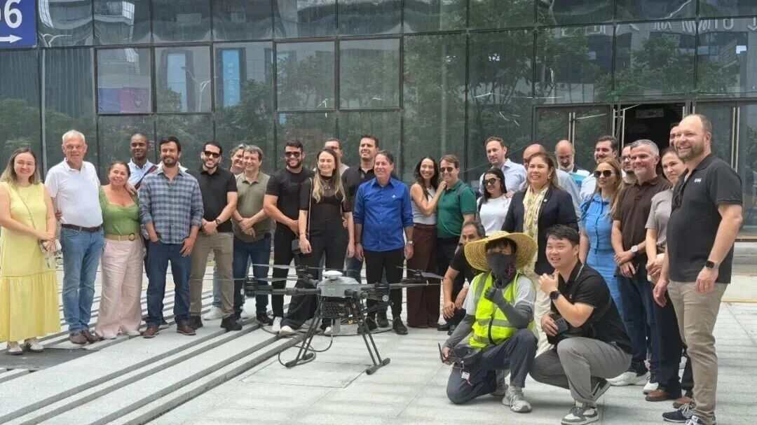 Professional drone window cleaning operation on high-rise building facade Professional drone window cleaning operation on high-rise building facade