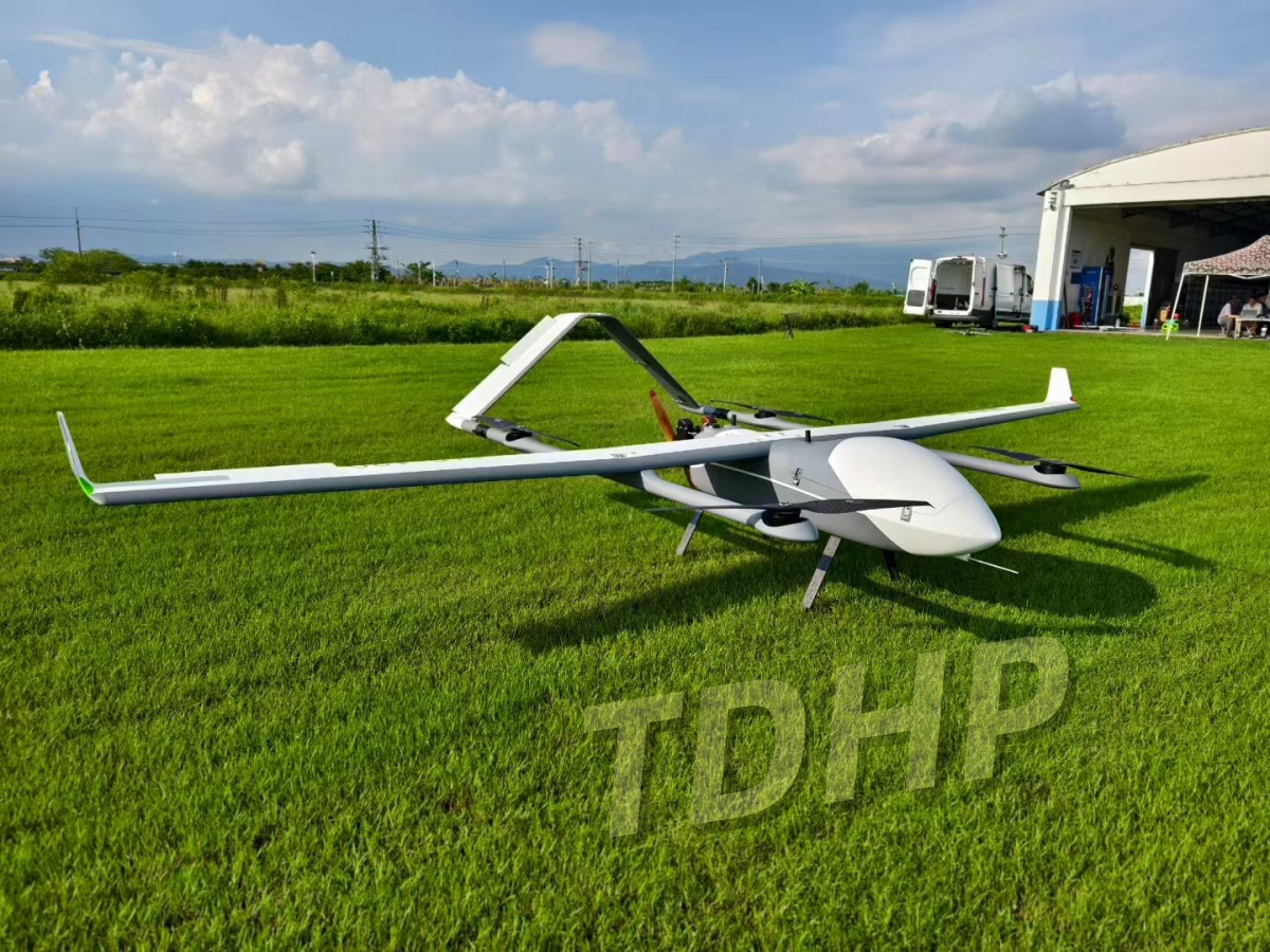 VTOL fixed-wing drone flying long-range mission with hybrid power system