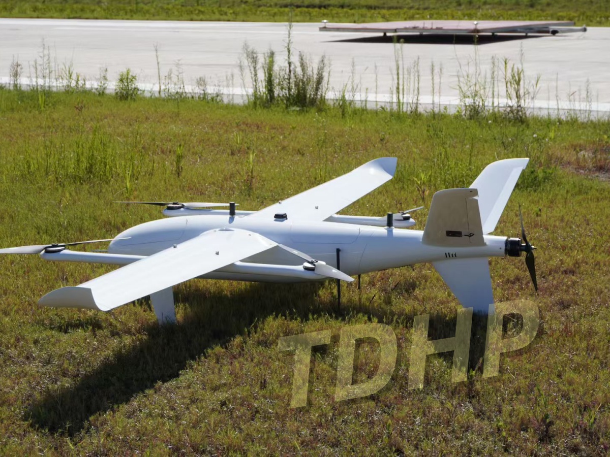 VTOL fixed-wing drone flying long-range mission with hybrid power system