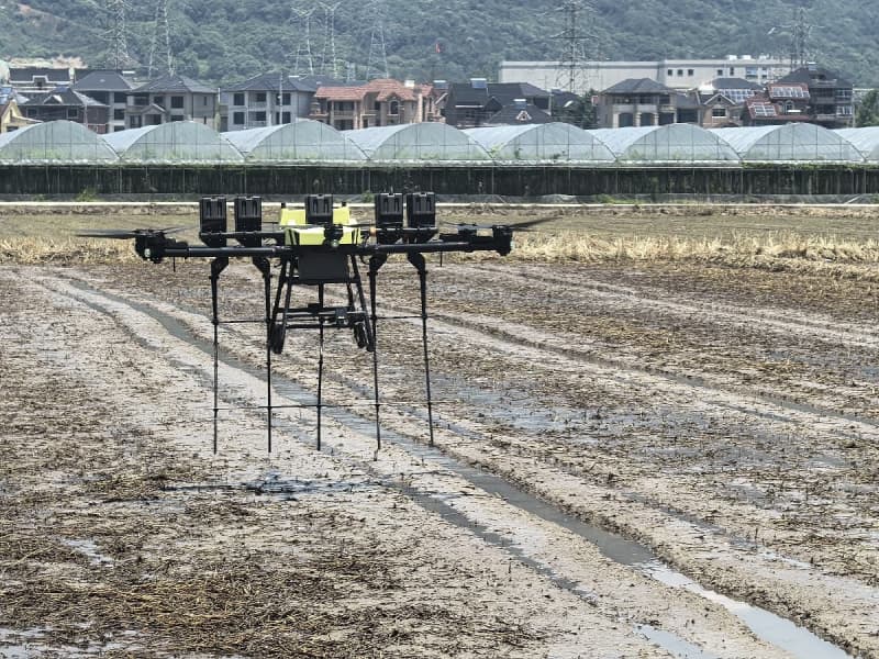 Precision Agriculture drone seeding rice seeds in orderly rows for optimized Crop Care Precision Agriculture drone seeding rice seeds in orderly rows for optimized Crop Care
